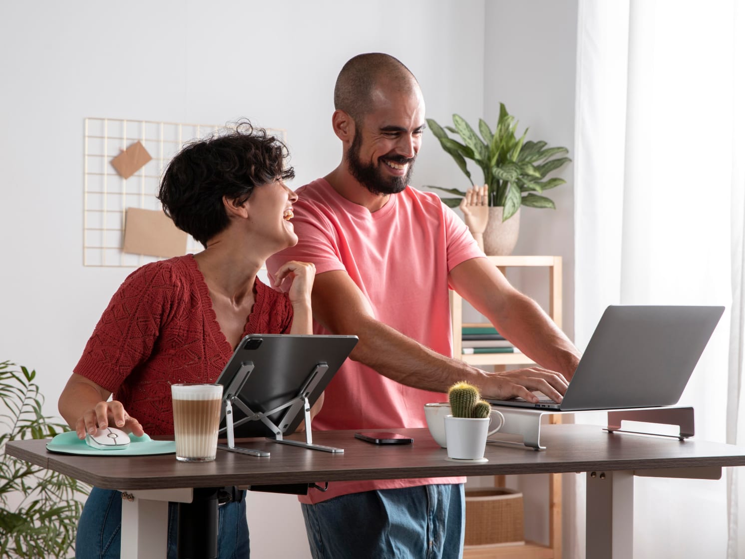 Two colleagues happily working together